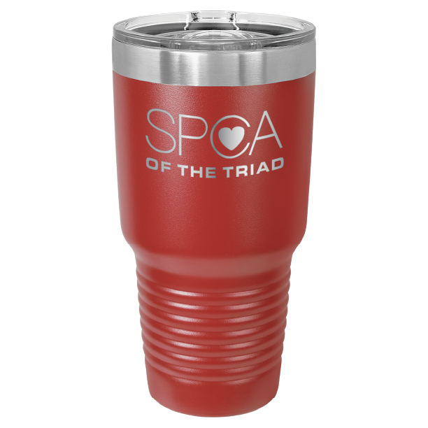 Red 30 oz laser engraved tumbler featuring the SPCA of the Triad logo.