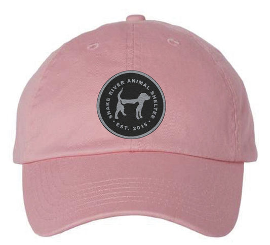 Pink Snake River Animal Shelter patch hat with black and silver patch.