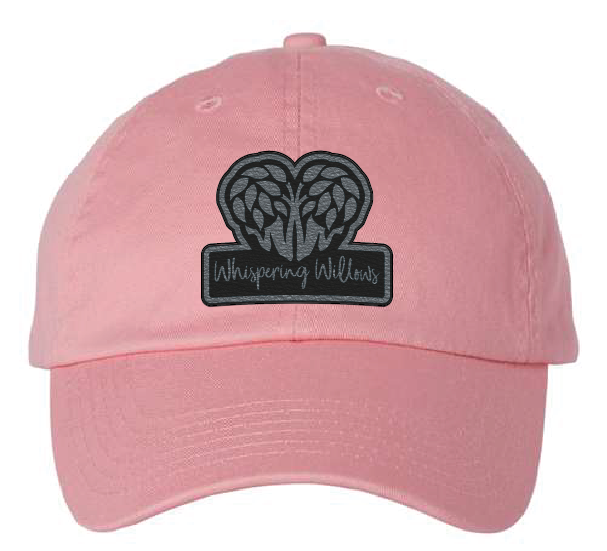 Pink Dad hat with the Whispering Willows logo. Black patch that engraves to silver.