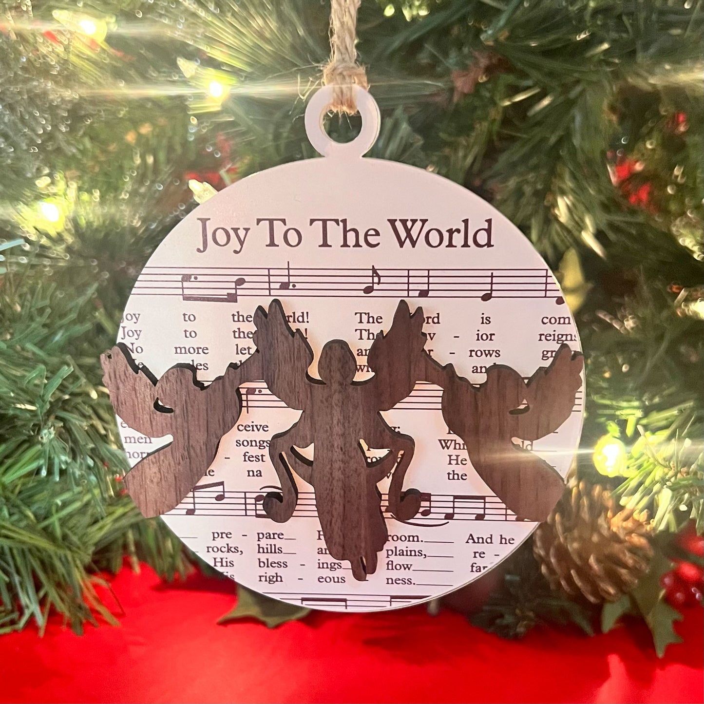 The Biblical Christmas Story Ornament: Sheet Music with triumphant angels: "Joy to the World."