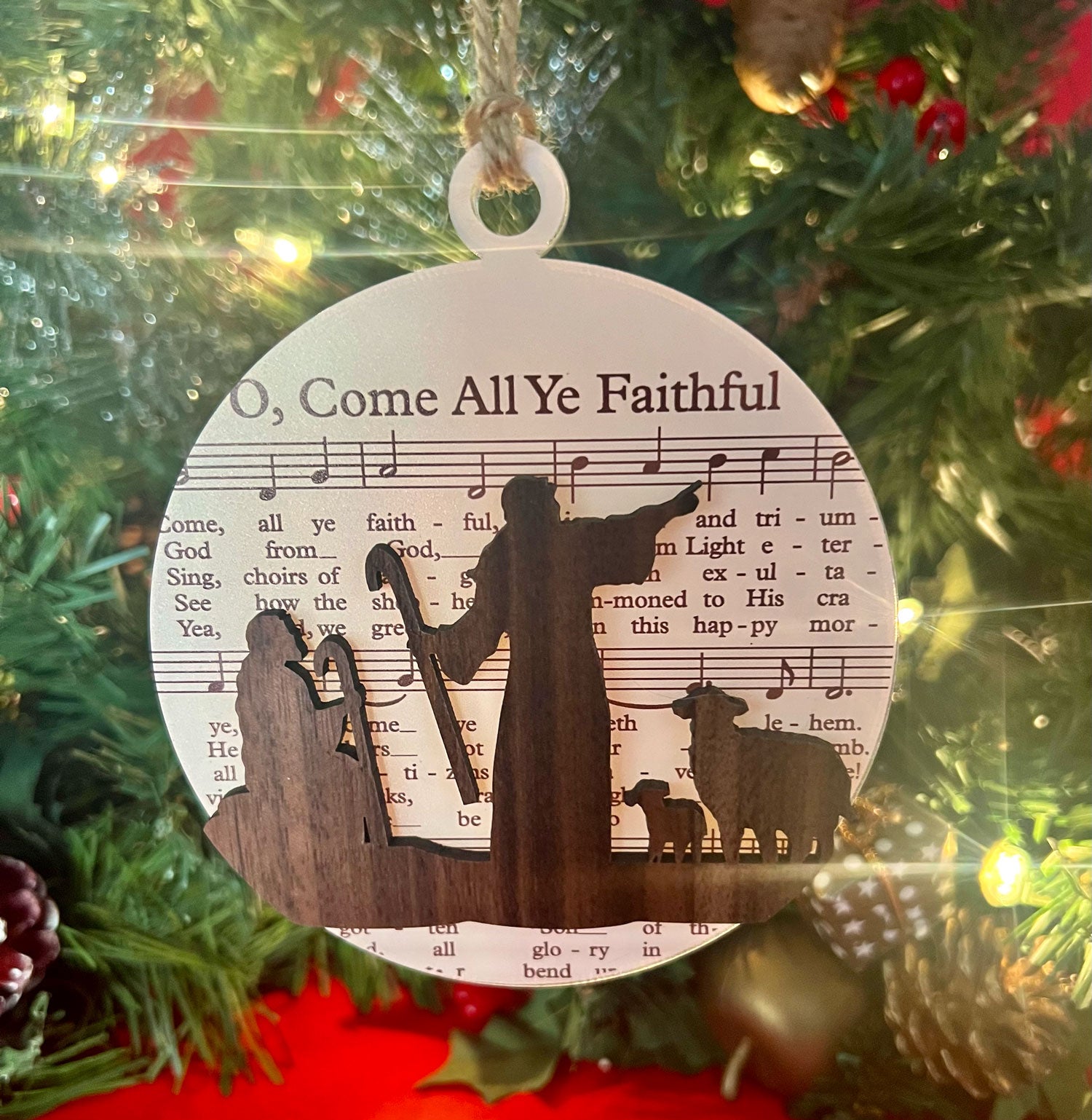 The Biblical Christmas Story Ornament: Sheet Music with Shepherds and sheep "O, Come All Ye Faithful"