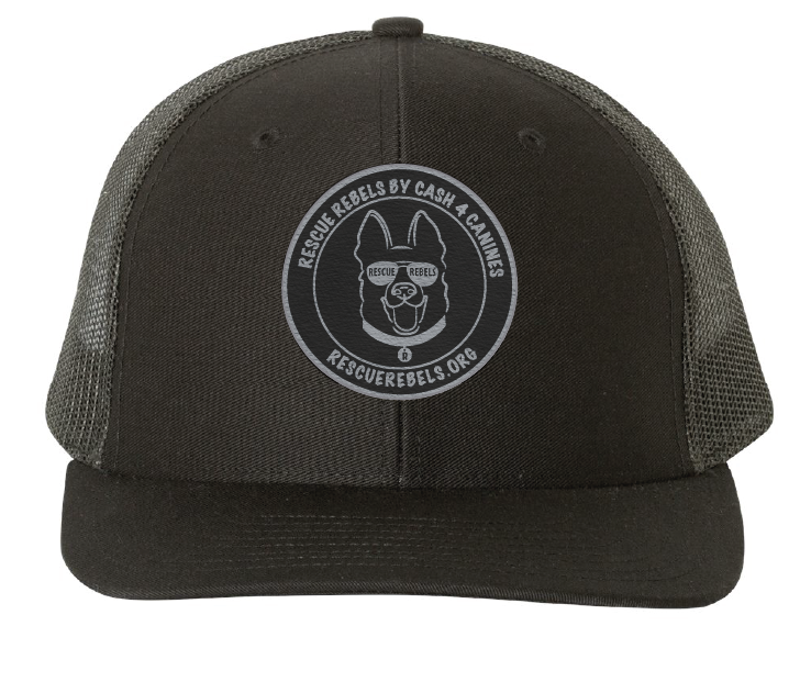 Black trucker hat featuring the Rescue Rebels logo in a black and silver leatherette patch. Front view.