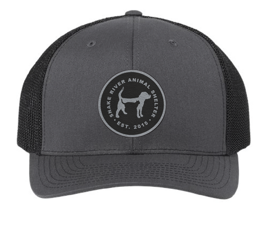 Black/Charcoal Snake River Animal Shelter trucker patch hat with black and silver patch.