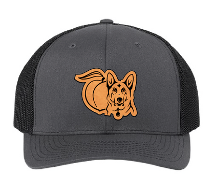 Black and charcoal trucker hat with peach and German Shepherd leather patch.