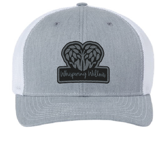 Gray and White trucker hat with the Whispering Willows logo in black and silver